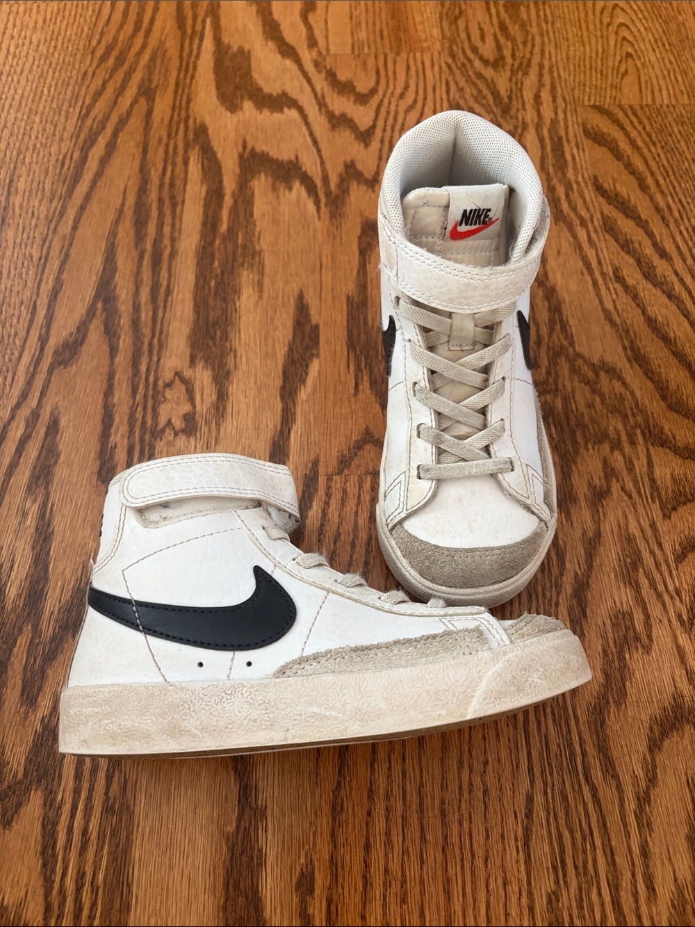 Nike Kids High-Top Sneakers in White with Black Swoosh
